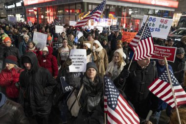 New York, NY - December 17, 2019: Few hundreds people rally in support of impeachment of President Trump from Times Square to Union Square along Broadway