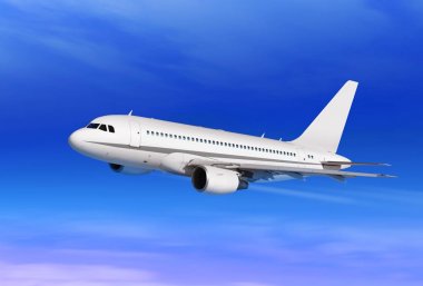 passenger plane in blue sky clipart