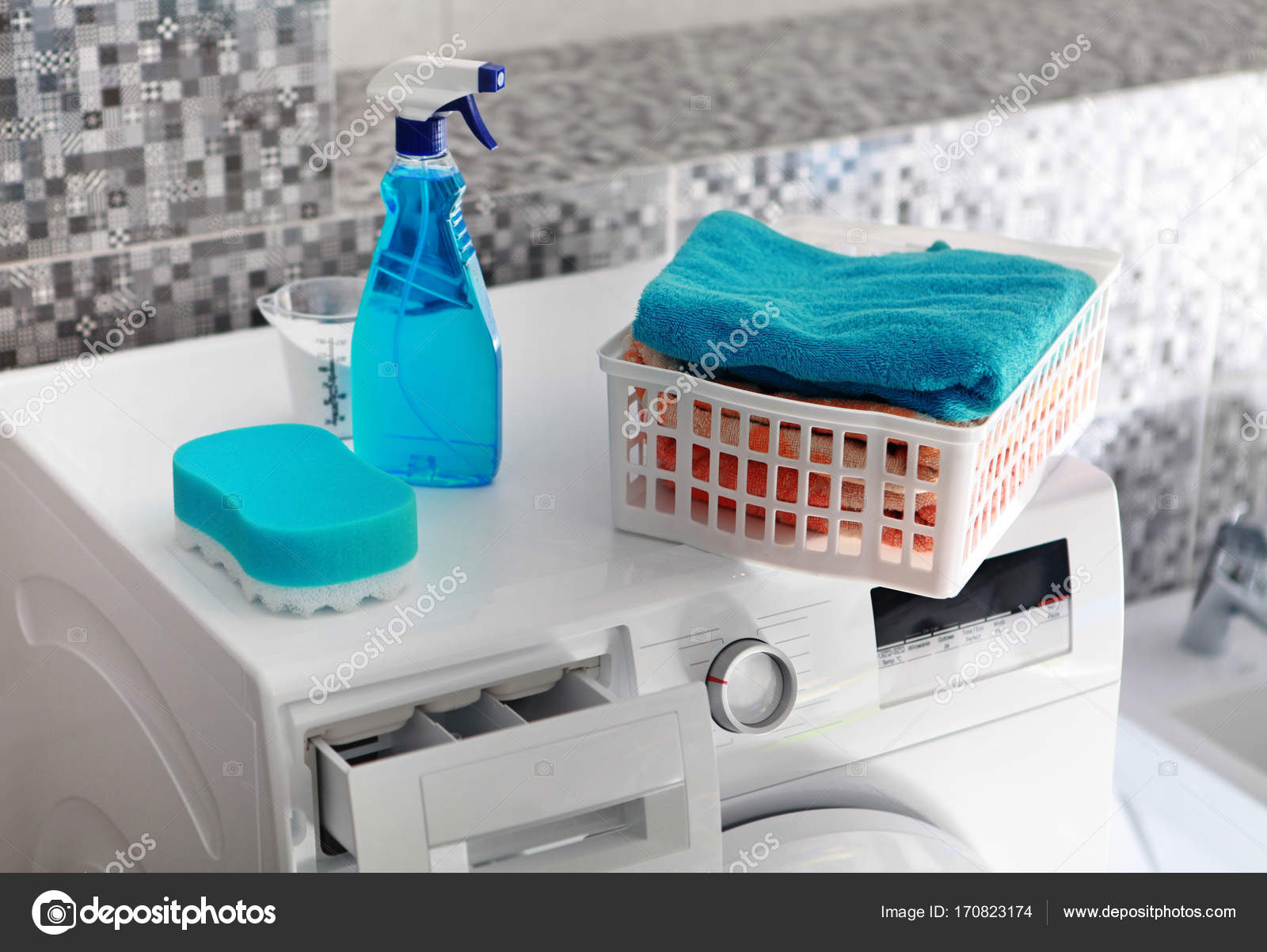 Laundry powder on washing machine Stock Photo by ©ssuaphoto 170823174