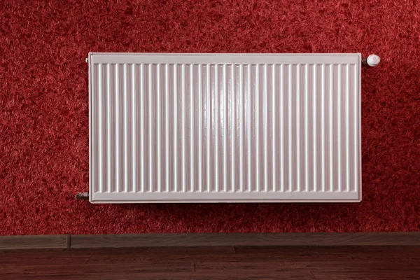 Radiator in red room — Stock Photo, Image