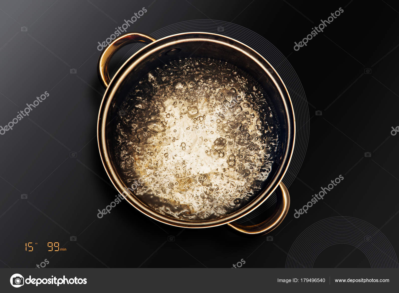 Saucepan on black induction cooktop Stock Photo by ©ssuaphoto 179496540
