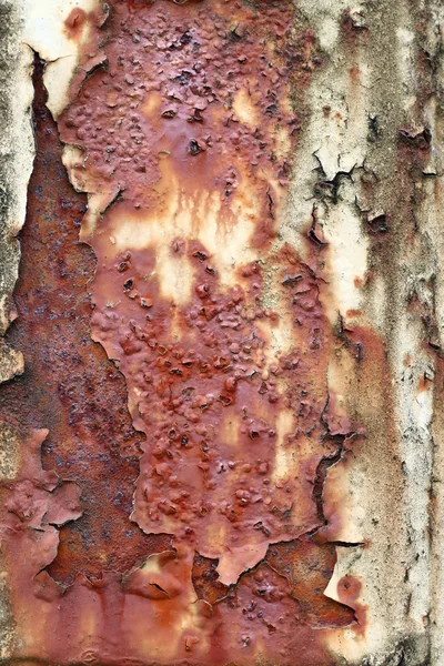 Abblätternde Farbe auf rostigem Eisen — Stockfoto