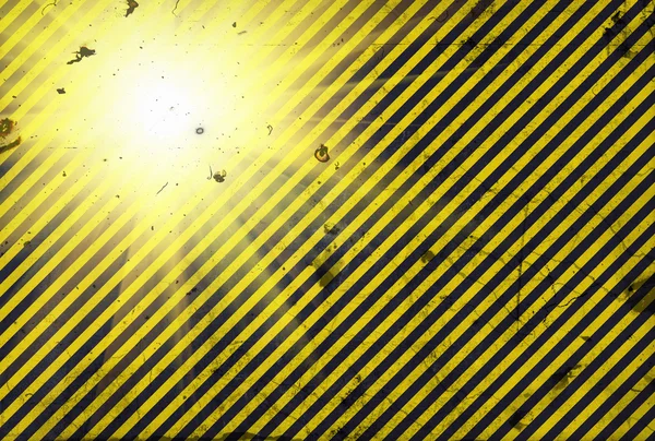 Shining warning black and yellow diagonal lines in grunge style — Stock fotografie