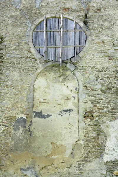 Bricked up door and boarded window — Stock Photo, Image