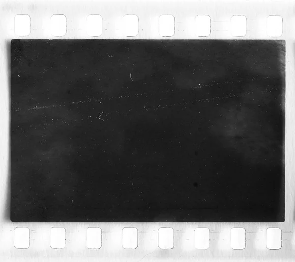 Real film frame with dust and scratches — Stock Photo, Image