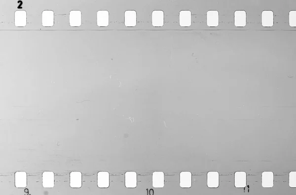 Vieux film celluloïd avec poussière et rayures — Photo