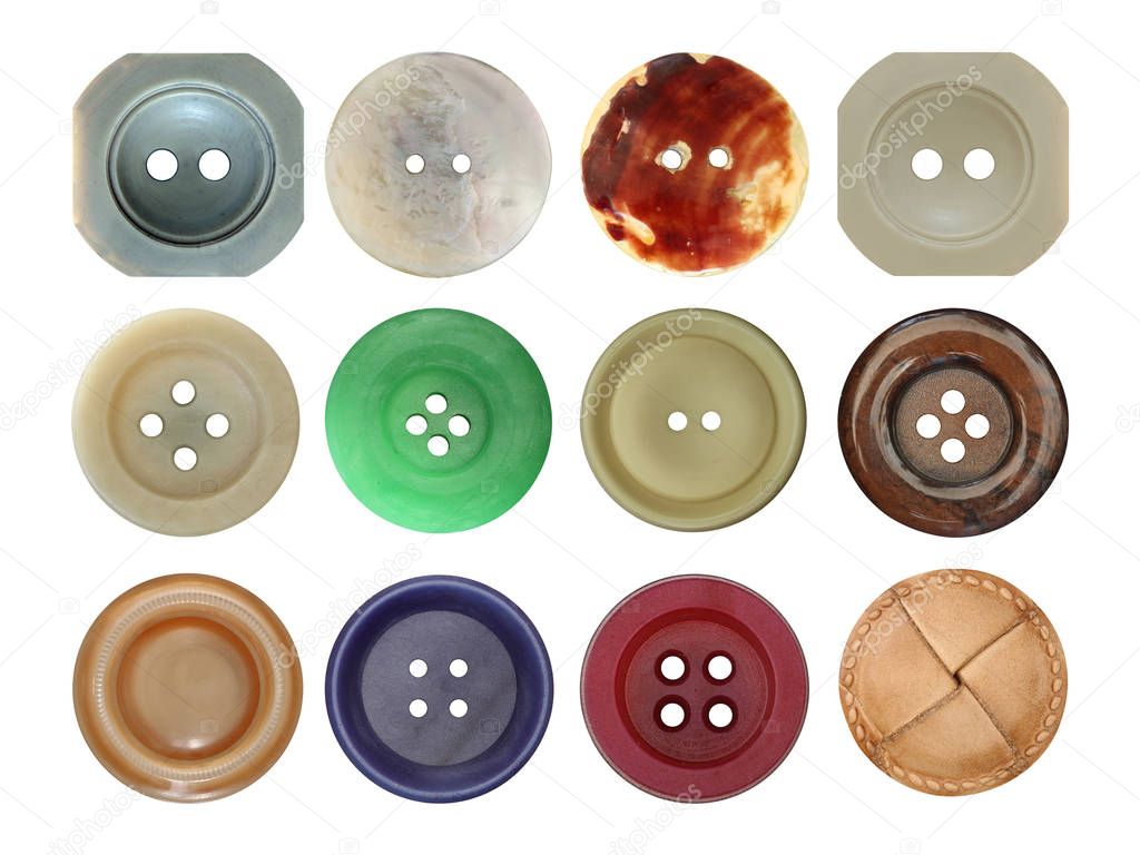 Various old and used buttons on white background