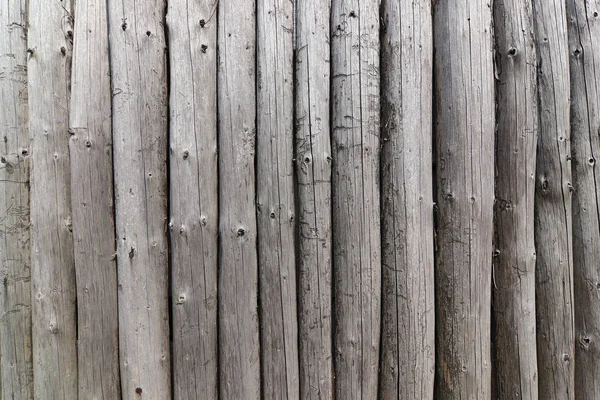 Parede dos postes de madeira — Fotografia de Stock