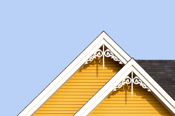 Roofs with gingerbread style fretwork of typical wooden houses of Magdalen Islands, in Canada — Stock Image Roofs Gingerbread Style Fretwork Typical Wooden Houses Magdalen Islands Canada Stock Image