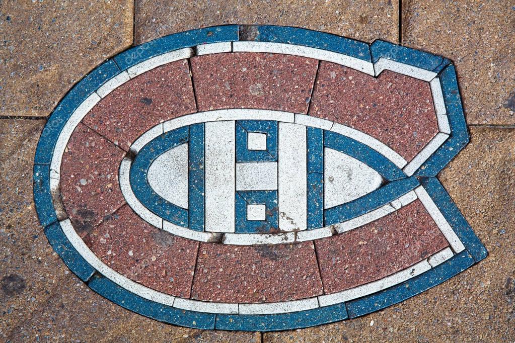 Montreal, Canada - 21st August 2014: The emblem for the Montreal Canadiens Ice Hockey team set into the pavement outside the Bell Centre sports and entertainment complex.