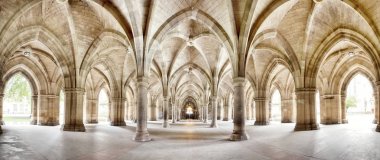 The historic Cloisters of Glasgow University. Panorama of the exterior walkway. Image taken from a public position. clipart