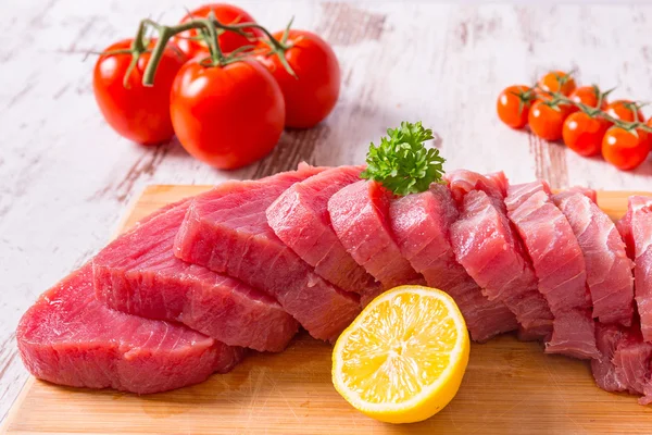 Tuna steaks on the plate — Stock Photo, Image