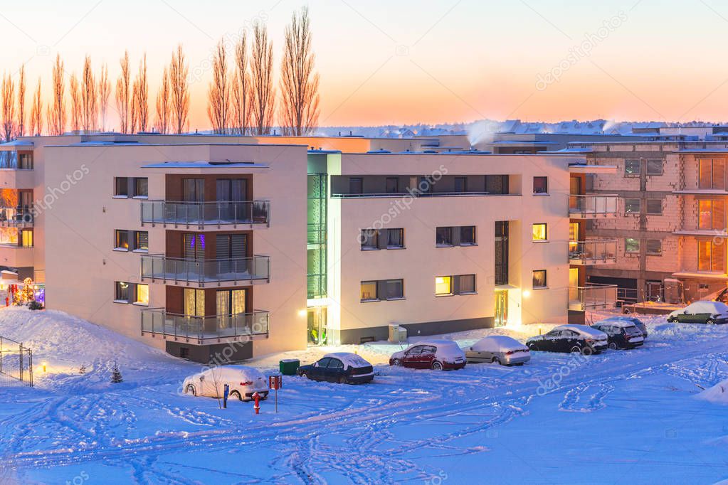 Street after heavy snowfall at sunset