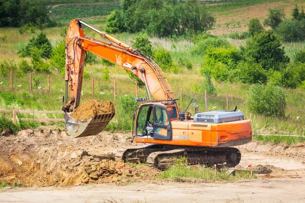 An excavator working removing ground — Stock Photo, Image