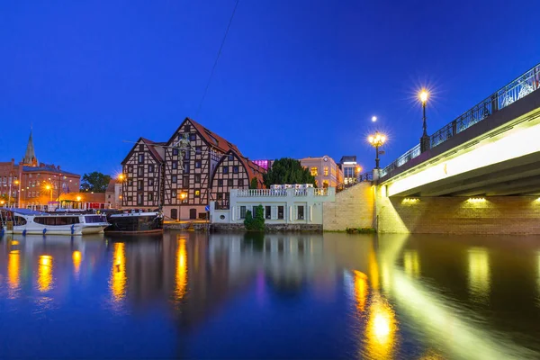 Bridge in Bydgoszcz city over Brda river at night — Stock Photo, Image