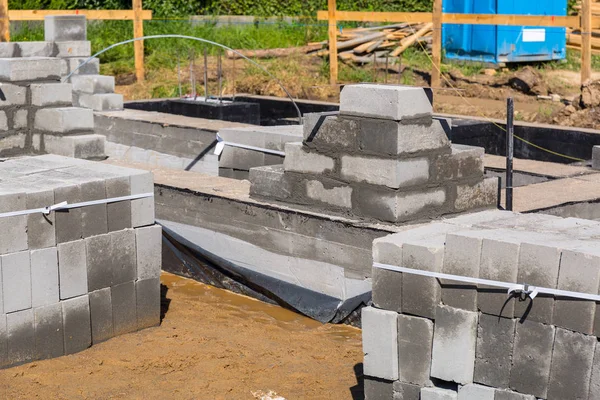 Brick up concrete blocks for foundation — Stock Photo, Image