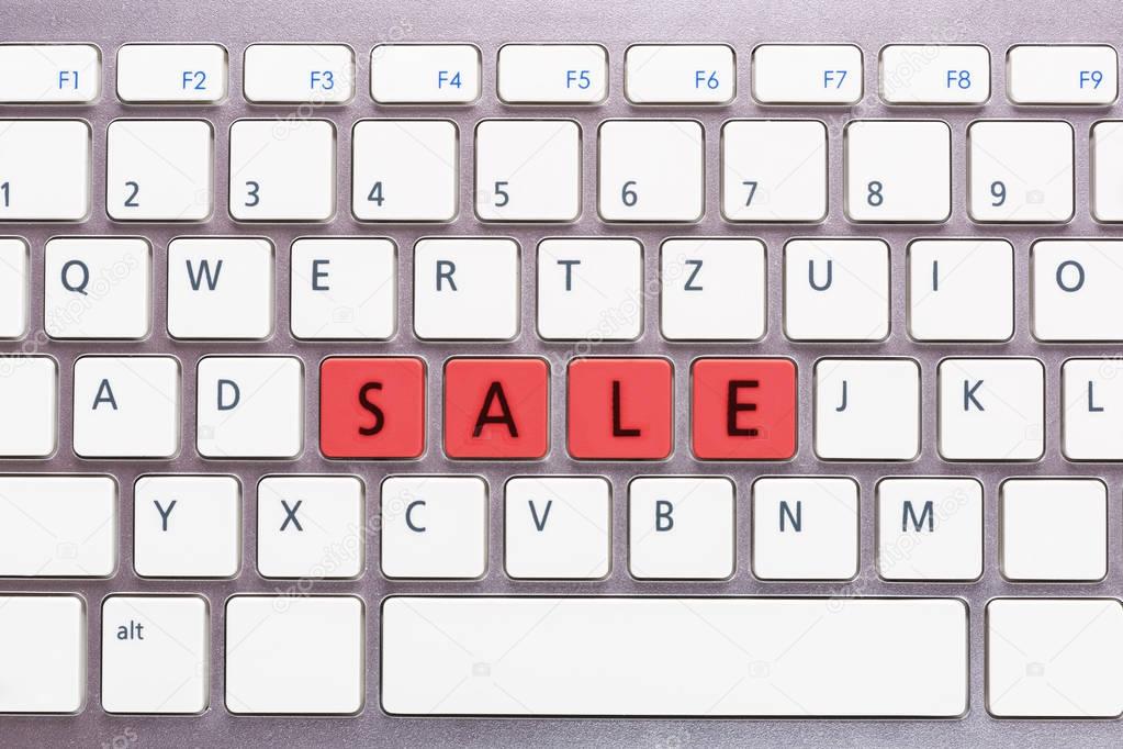 Computer keyboard with sale word. Internet marketing concept
