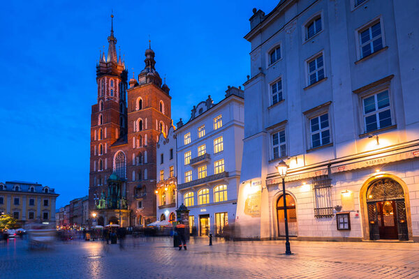 Krakow, Poland - November 12, 2017: The main square of the Old Town in Krakow at dusk, Poland. Krakow is the second largest and one of the oldest cities in Poland.