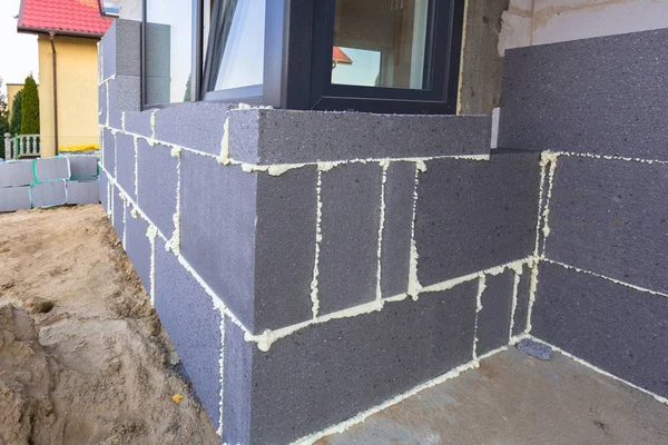 Graphite styrofoam insolation on the new house under constructio — Stock Photo, Image