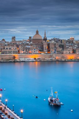 Architecture of Valletta, the capital of Malta at dusk. clipart