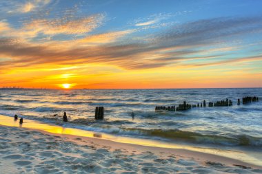Beautiful beach of the Baltic Sea at sunset in Gdansk, Poland