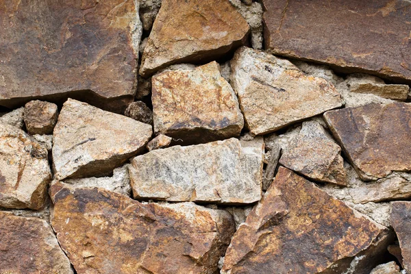Steinmauer. Hintergrund Naturstein. — Stockfoto