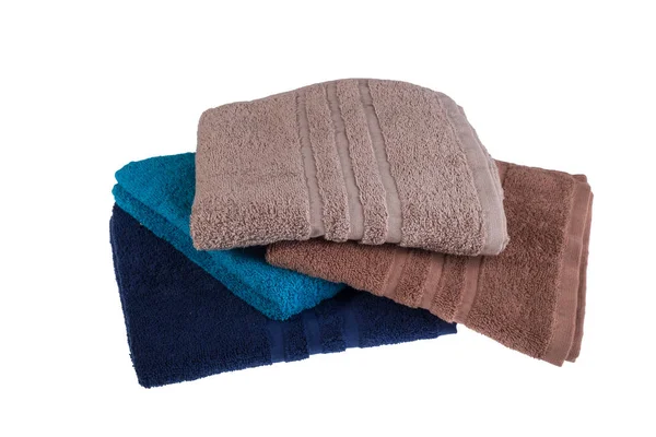 Pile of colored towels isolated on white background — Stock Photo, Image