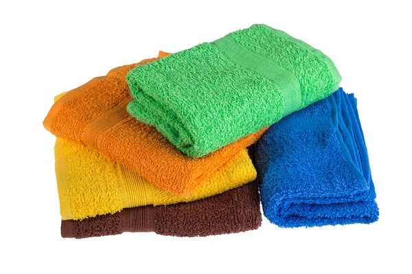 Pile of colored towels isolated on white background — Stock Photo, Image