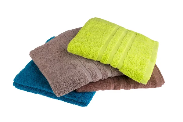 Pile of colored towels isolated on white background — Stock Photo, Image