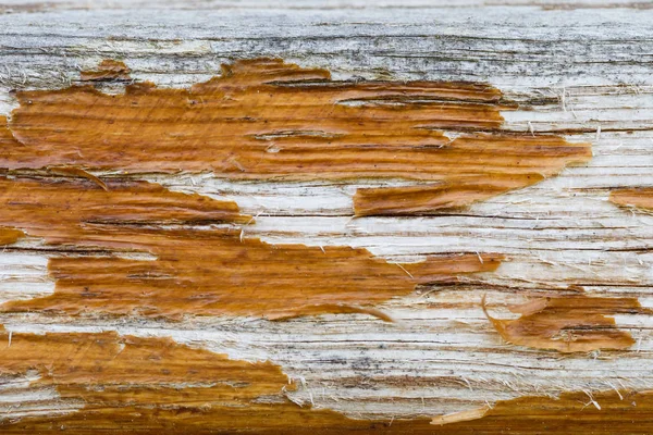 Starý popraskaný nátěr vzorek na dřevěné pozadí. Loupání barvy. — Stock fotografie
