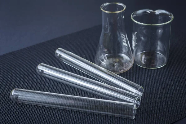 Laboratory glass over black background — Stock Photo, Image