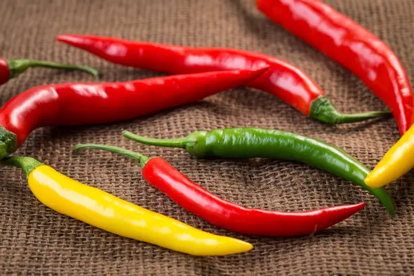Fresh chili peppers - yellow, green and red chili pepper — Stock Photo, Image