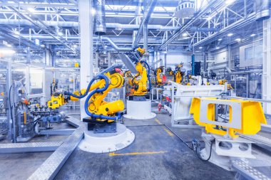 Araba fabrikasındaki robotlar