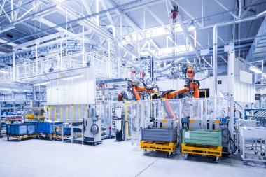 Araba fabrikasındaki robotlar
