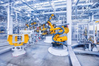 Araba fabrikasındaki robotlar