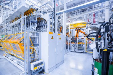 Araba fabrikasındaki robotlar