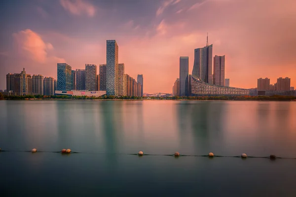 Sunset over Swan Lake financial business district, Hefei city, China — Stock Photo, Image