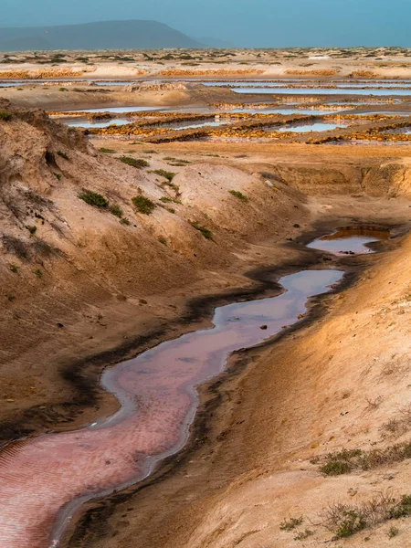 Ditch full of sand, water and salt — Stock Photo, Image