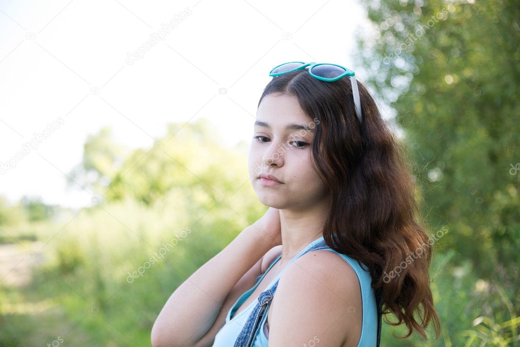 Girl teenager turned looking over shoulder