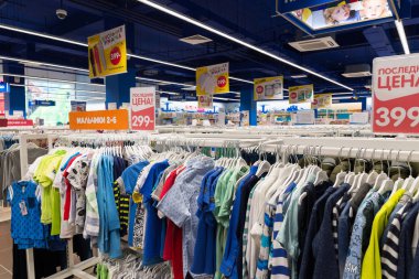 Moscow, Russia - August 30.2016. Children's world - network of children's clothing stores. Clothes for boys clipart