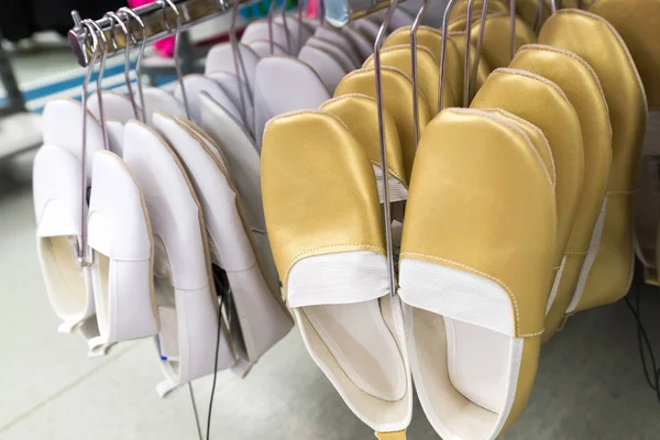 Gold and White Gym shoes in store — Stock Photo, Image