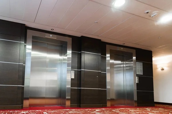 Two elevators with metal doors in hotel — Stock Photo, Image