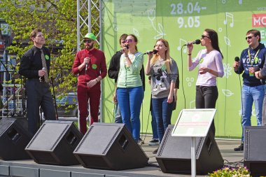 Moscow, Russia - may 06.2017. Group Marcellus voices at festival acappella Moscow Spring on Revolution square clipart