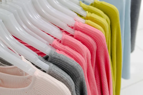 Womens sweaters on hanger in the store — Stock Photo, Image