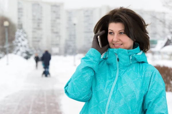 Woman talking on phone in city of Moscow, Russia Stock Image