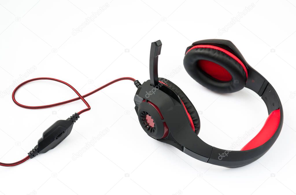gaming headphones with cord on white background
