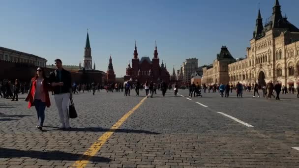 Moscow, Russia - April 14. 2018. People are walking on Red Square along Gum store — Stock Video