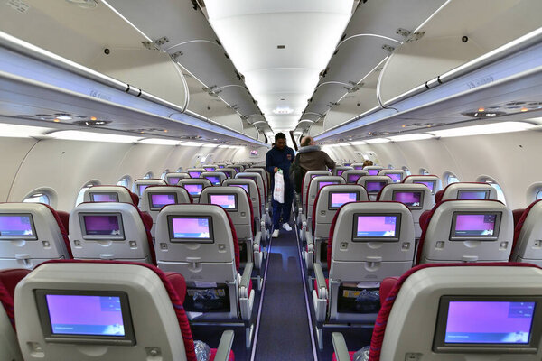 Doha, Qatar - Nov 17. 2019. Salon Airbus A320 Economy class of Qatar Airways