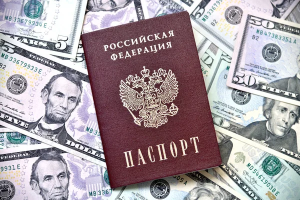 Russian foreign passport and an dollar banknote — Stock Photo, Image