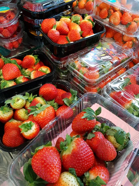 Moscow, Russia - Jan 27. 2020. Fresh strawberries in plastic containers at the Perekrestok store — ストック写真
